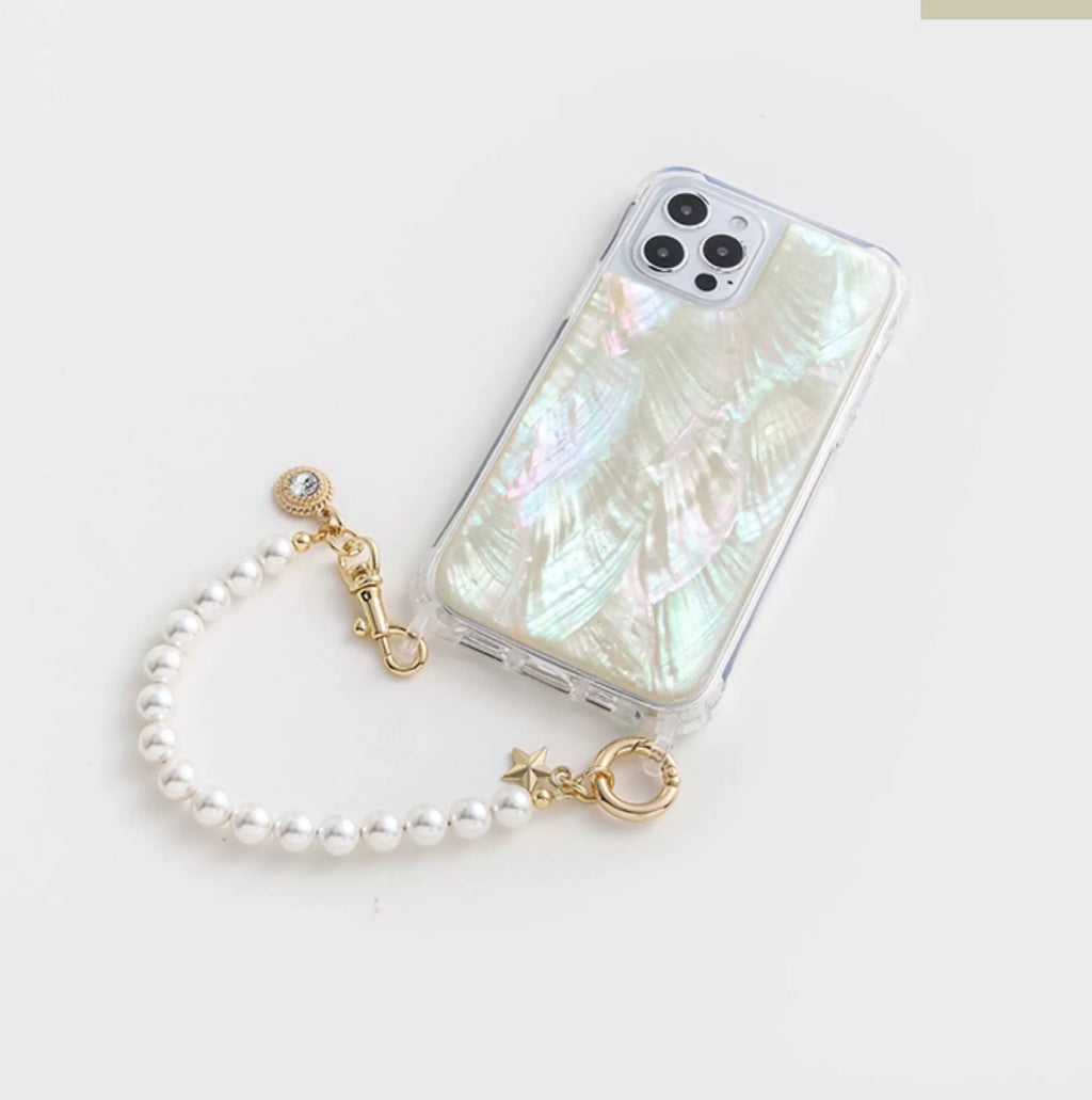 Phone case with pearl charm on a white background from London based gemstone jewellery designer WJY studio